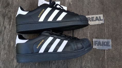 fake adidas baseline|real vs fake adidas.